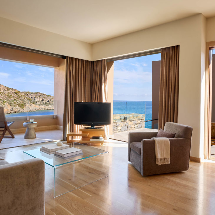 One-bedroom villa living room at Daios Cove luxury resort in Crete.