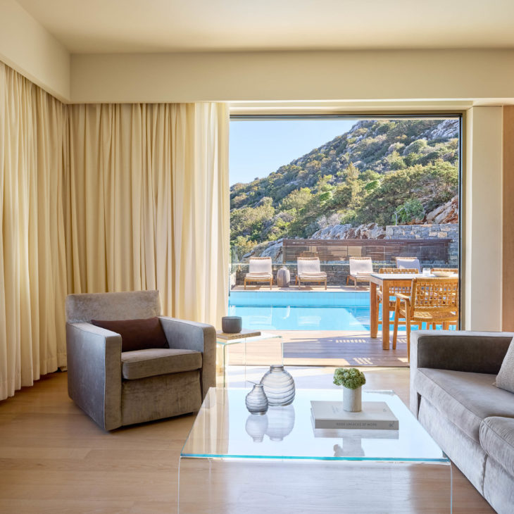 Living room of a three-bedroom villa at Daios Cove luxury resort in Crete
