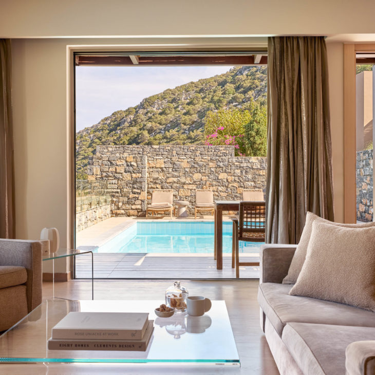 Living room of a two-bedroom wellness villa at Daios Cove luxury resort in Crete